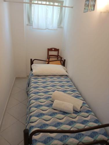 Postel nebo postele na pokoji v ubytování Nadir