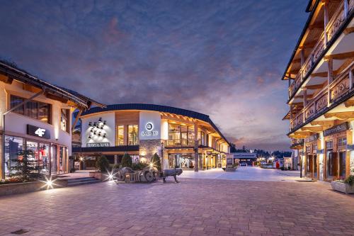 a large building with a street in the middle at Hotel Bania Thermal & Ski in Białka Tatrzanska
