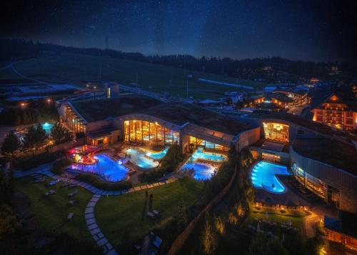 an overhead view of a building at night at Hotel Bania Thermal & Ski in Białka Tatrzanska