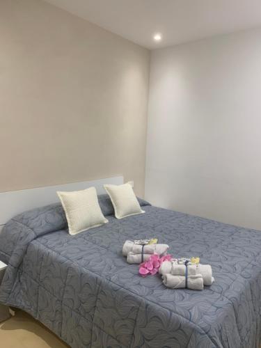 Letto o letti in una camera di Appartamento centro Elpidio Blu