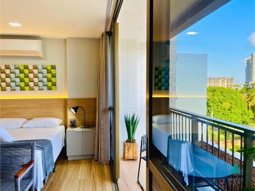 Postel nebo postele na pokoji v ubytování J. Smart Guararapes by Holiday Stays