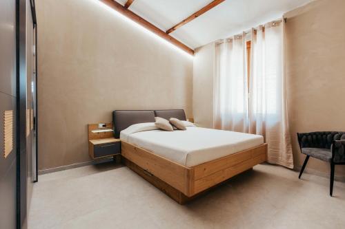 Postel nebo postele na pokoji v ubytování Resort Ombreseda