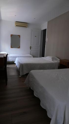 Katil atau katil-katil dalam bilik di Residencial Moderna