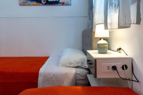 Letto o letti in una camera di Principe Umberto Luxury House