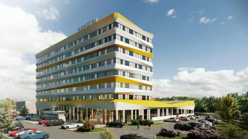 d'un bâtiment avec un parking dans l'établissement Novotel Zagreb, à Zagreb