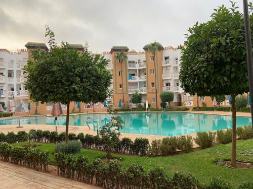 Kolam renang di atau dekat dengan Al kawtar Vacation apartment in Mansouria