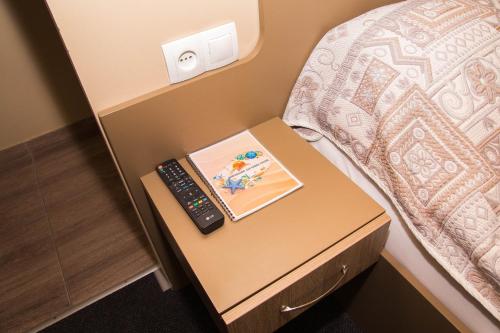Cama o camas de una habitación en Yuzhniy Dvorik