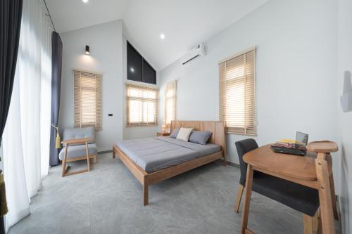 Ένα ή περισσότερα κρεβάτια σε δωμάτιο στο Songmee Pool Villa Nikompattana