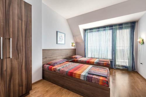 Katil atau katil-katil dalam bilik di Fantasy Apartments Saint Constantine and Helena Resort