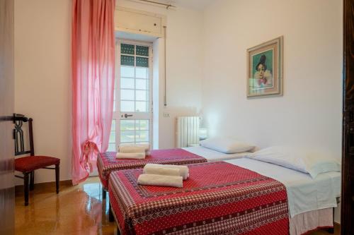 Ένα ή περισσότερα κρεβάτια σε δωμάτιο στο Villa Gianfreda