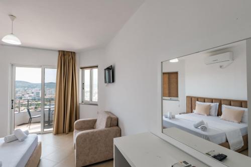 Postel nebo postele na pokoji v ubytování Sunshine Hotel