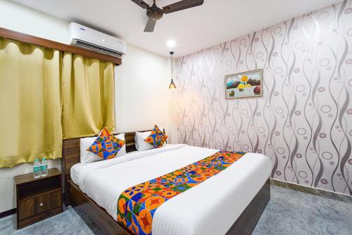 Postelja oz. postelje v sobi nastanitve FabHotel Elite Inn- Nr JNTU Metro Station JNTU College