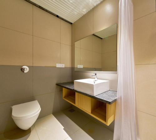 Koupelna v ubytování Elite Inn, Kolhapur