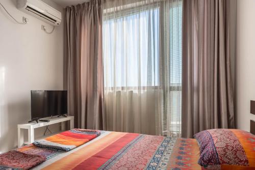 Katil atau katil-katil dalam bilik di Fantasy Apartments Saint Constantine and Helena Resort