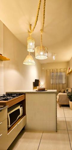 Nhà bếp/bếp nhỏ tại Sua casa fora de casa,para você e sua família