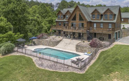 an aerial view of a large house with a swimming pool at Shirley's Bed and Breakfast in Roanoke