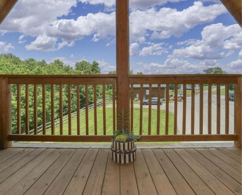 a porch with a potted plant on a deck at Shirley's Bed and Breakfast in Roanoke