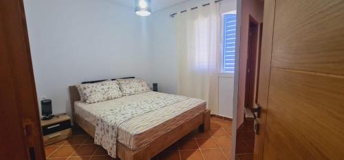 Postel nebo postele na pokoji v ubytování Martil wow