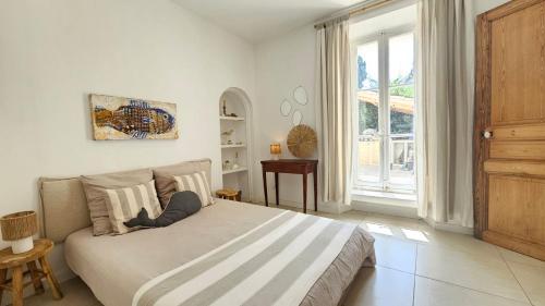 Ένα ή περισσότερα κρεβάτια σε δωμάτιο στο Casa Andréa Agreable T3 avec grand jardin à 3mn de la plage