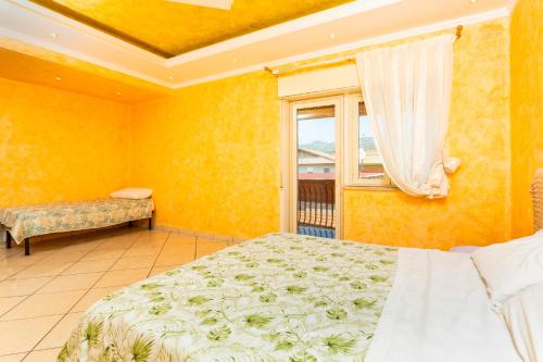 Postel nebo postele na pokoji v ubytování Da Lorenzo Apartment Alcantara