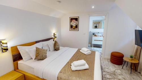 Ένα ή περισσότερα κρεβάτια σε δωμάτιο στο Eden Chalet