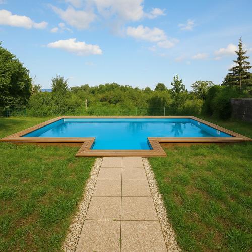 a swimming pool in the middle of a grass field at Villa Felix with spectacular pool in green oasis in Opatija