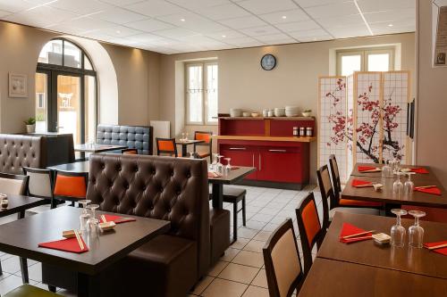 Posezení v ubytování Hôtel de Genève et Restaurant , Faverges-Seythenex