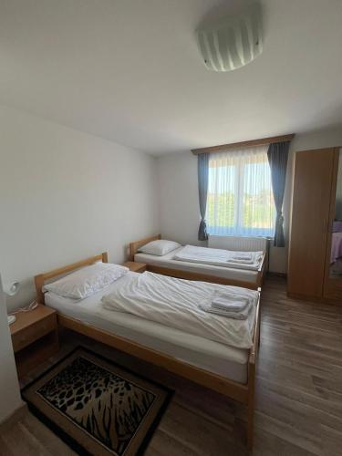 Postel nebo postele na pokoji v ubytování Motel i Restoran Ana