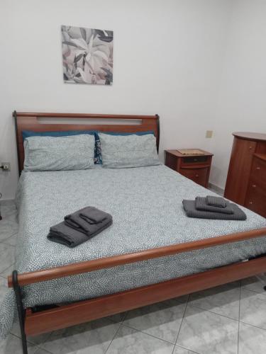 Ένα ή περισσότερα κρεβάτια σε δωμάτιο στο Casa Ines