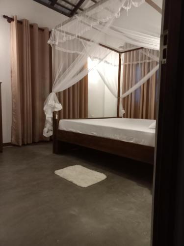 Postel nebo postele na pokoji v ubytování Hemal house