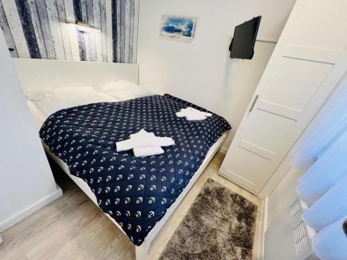 Ένα ή περισσότερα κρεβάτια σε δωμάτιο στο Ferienhaus Anchor