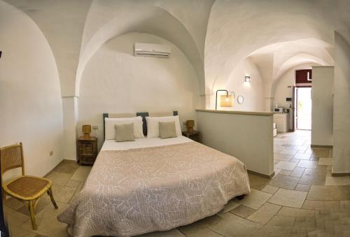 Postel nebo postele na pokoji v ubytování Masseria Rescio