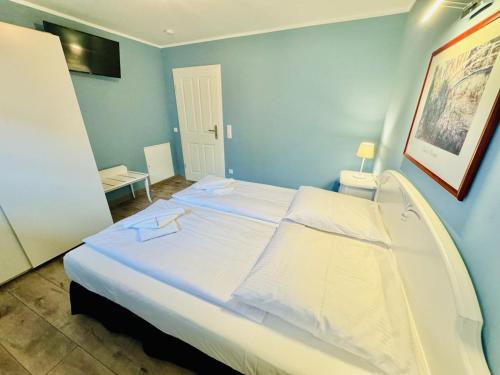 Giường trong phòng chung tại Haus Bütt