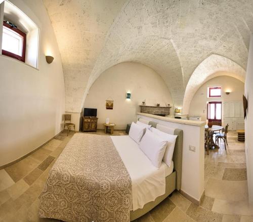 Postel nebo postele na pokoji v ubytování Masseria Rescio