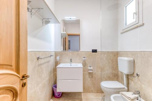 Un baño de Le Colonie - Pescoluse