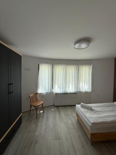 Letto o letti in una camera di Gorna Banya luxury apartments
