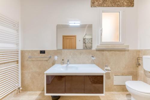 Un baño de Le Colonie - Pescoluse