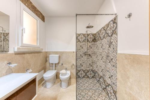 Un baño de Le Colonie - Pescoluse