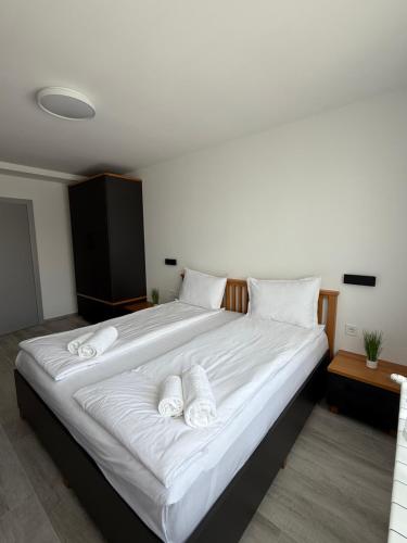 Letto o letti in una camera di Gorna Banya luxury apartments