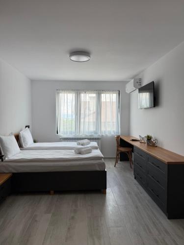 Letto o letti in una camera di Gorna Banya luxury apartments