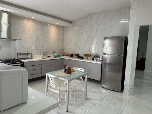 Kuchyň nebo kuchyňský kout v ubytování Perto do Shopping - Excelente 250m