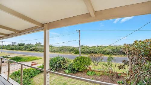 a porch with a view of a street at Marilyn's in Callala Beach