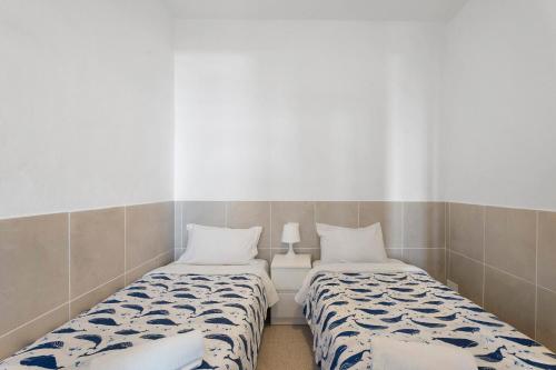 Postel nebo postele na pokoji v ubytování Apartamentos Playa Azul - 3