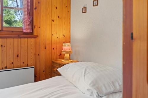 Postel nebo postele na pokoji v ubytování Sauna, nature & parking privé - Vercorin, 10 pers