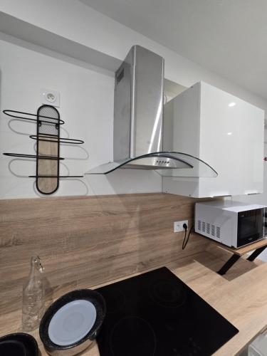 Η κουζίνα ή μικρή κουζίνα στο Logement entier 35m2 avec wifi - 2chambres - rénové - hypercentre Foix