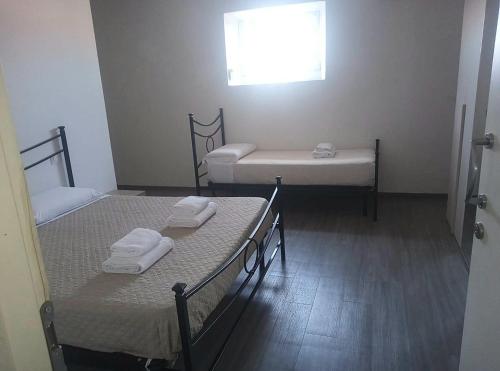 Cama o camas de una habitación en MAGNOLFI Superior