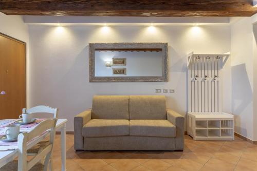 a living room with a chair and a table at Tuscan Break in Campi Bisenzio