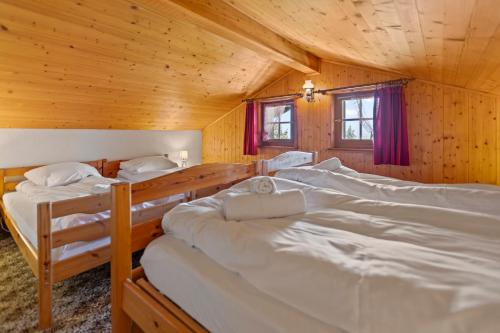 Postel nebo postele na pokoji v ubytování Sauna, nature & parking privé - Vercorin, 10 pers