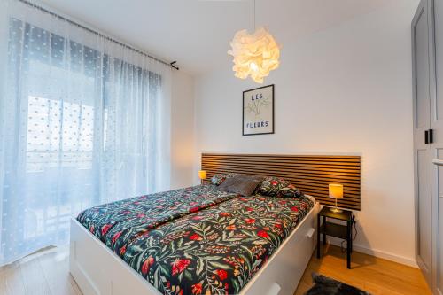 a bedroom with a bed and a large window at Flex SelfCheckIns 142 - Zagreb - Bedroom - Garage - Loggia in Zagreb