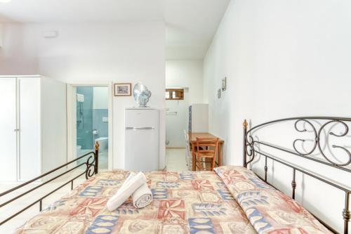 Cama o camas de una habitación en Le Colonie - Pescoluse